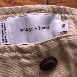 Wings + Horns khaki shorts.